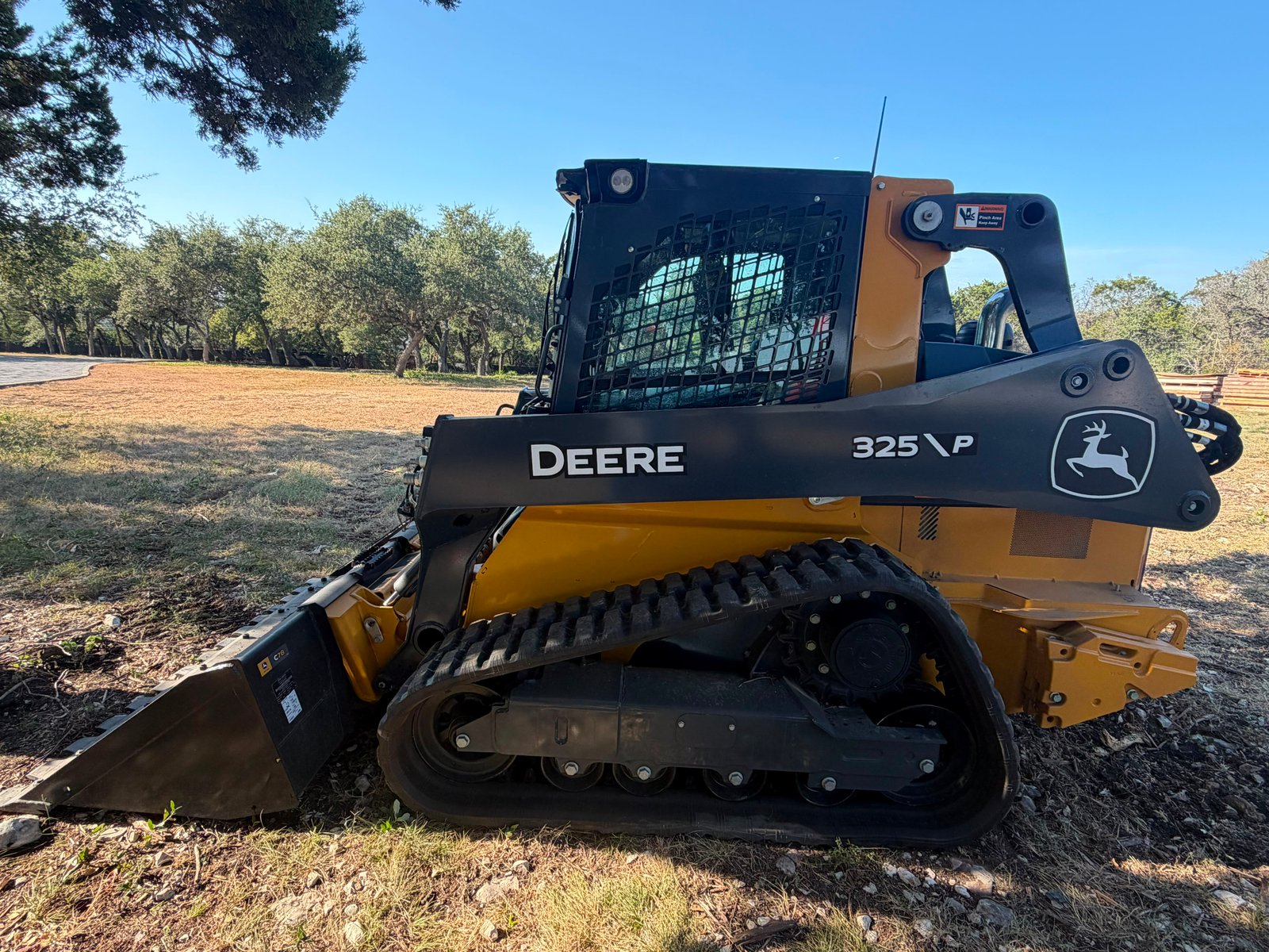John Deere loader with tooth bucket